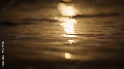 Golden Hour Reflections - Serene Water Surface at Sunset.