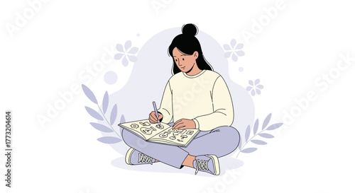Creative Young Woman Sketching Ideas In A Notebook, Sitting With Legs Crossed On White Background