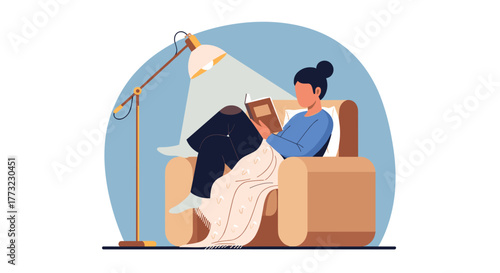 A young woman enjoys a peaceful evening, comfortably nestled in an armchair under the warm glow of a lamp, engrossed in a captivating book.