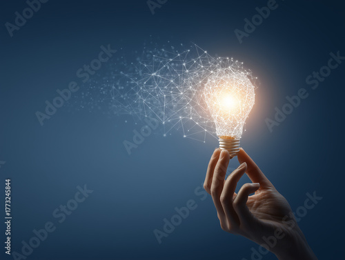 The Genesis of Connection: Hand Holding a Glowing Networked Idea