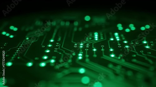 Close up macro shot of a glowing green circuit board with intricate pathways and illuminated nodes creating a futuristic technology background with bokeh effects