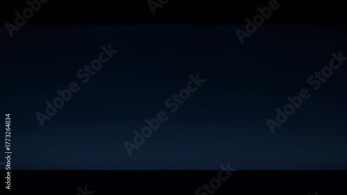 Dramatic Lightning Strike Illuminates Dark Stormy Sky with Jagged Branches of Light Against Heavy Clouds