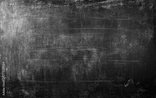 Blank chalk rubbed out on blackboard for text or drawing or education graphic. 