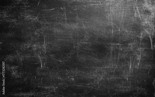 Chalk rubbed out on blackboard for background.