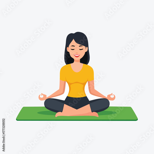 Young woman meditating in the lotus position on a green yoga mat.