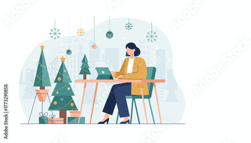 Professional woman works on a laptop in a festive office decorated for Christmas holidays