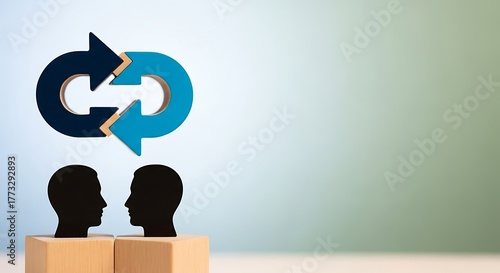 Two silhouetted heads facing each other with circular arrows above