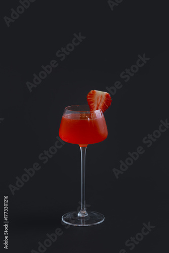 Delicious Strawberry Cocktail on black background.