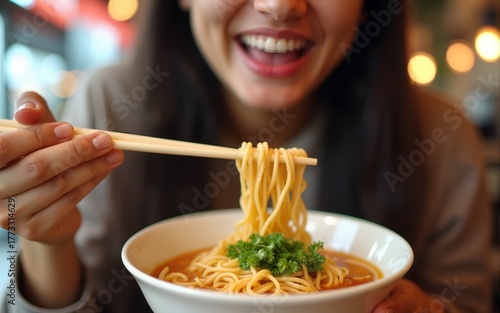 Woman, mouth and eating ramen in restaurant for dinner, meal and noodles in cafeteria. Closeup, hungry lady and chopsticks for bowl of spaghetti, Japanese cuisine and lunch break in fast food diner