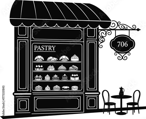 Charming parisian bakery facade with outdoor seating