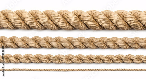 Three different thickness of natural fiber rope isolated on white background