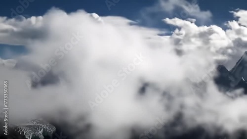 Majestic Mountain Peaks and Clouds - A Breathtaking Landscape.