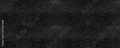 black brick wall texture as background or wallpaper for inserting text