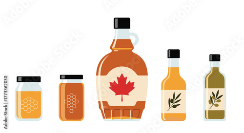 Assortment of natural food liquids: jars of honey with honeycomb, a jug of maple syrup with a Canadian leaf, and two bottles of olive oil with olive branch labels.