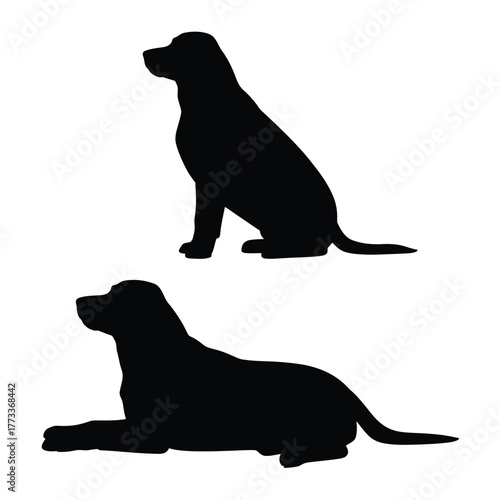 Two black dog silhouettes sitting and lying down on white background