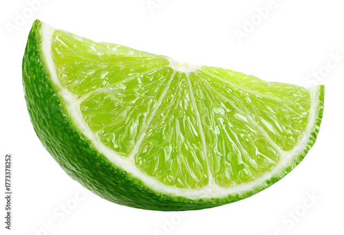 Fresh lime wedge with vibrant green peel and juicy segments
