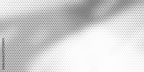 Hexagon halftone gradient texture. Abstract black grunge background. Geometric retro halftone tech overlay. Fading wavy hexagonal pattern backdrop.