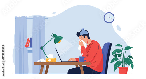 A sick man with an ice pack on his head and blowing his nose works from home on his laptop, surrounded by essential items for recovery and work.