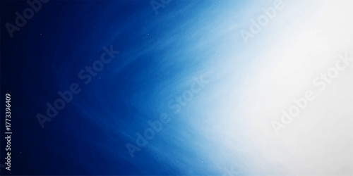 Bright, fluffy white clouds fill the blue sky on a clear summer day, creating a light abstract nature background