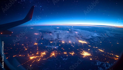 Breathtaking night view from an airplane window, capturing the illuminated city lights on the curved horizon of Earth under a star-filled sky