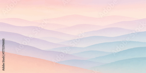 Beautiful mountain landscape with clouds and misty sunrise over the valley