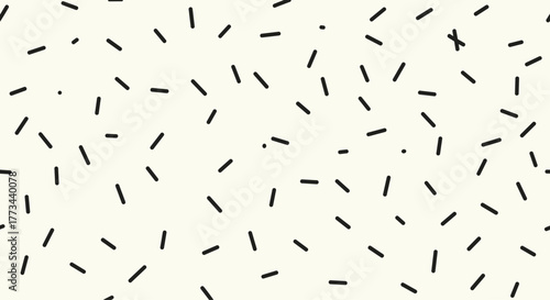 Hand-drawn scattered black dashes and dots create a playful abstract pattern on a light beige background.