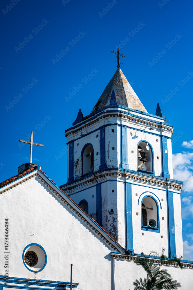 Fototapeta premium Beautiful blue and white colonial church in the center of Villavieja, Colombia