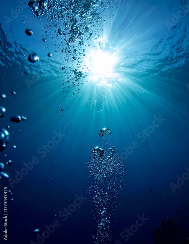 deep sea bubbles with light rays underwater