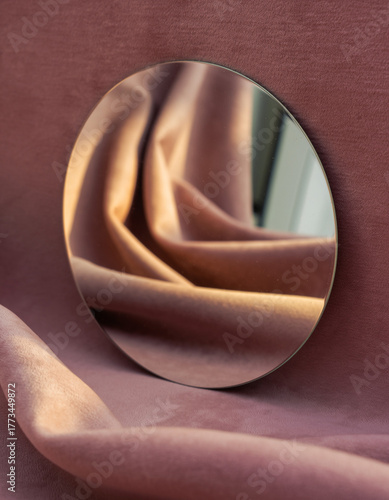 round mirror base with dusty pink background