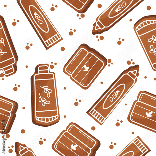 seamless pattern with gingerbread cookies in the shape and design of cosmetic tubes of various shapes for care cosmetics and crumbs around, for web design, stickers, branding and decor