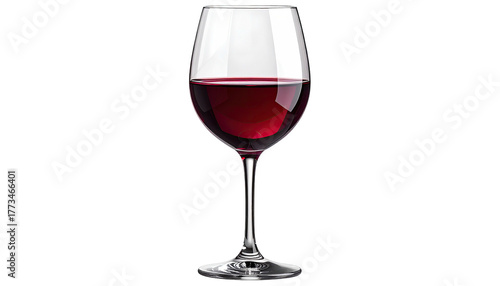 Crystal glass containing dark red wine on stark black background