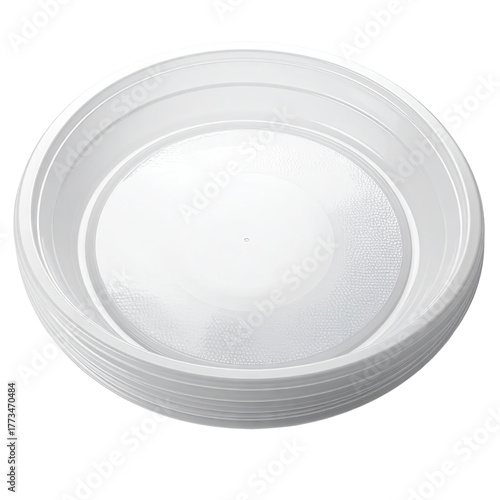 Stack of white, circular, disposable plates against a stark, black backdrop