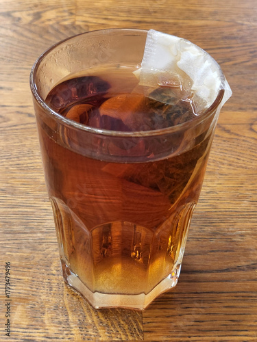 Tea. Black tea brewed in a glass. Hot brewed tea