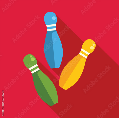 Three colorful bowling pins lying on a red background, creating a dynamic composition with a long shadow
