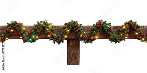 Festive Christmas garland with lights and red berries on rustic wooden beam, holiday decoration concept