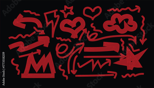 Vibrant red graffiti arrows hearts and abstract shapes on black background