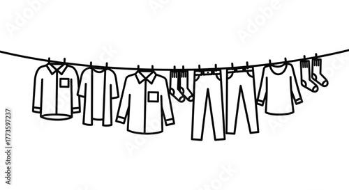 Clean laundry hanging on a clothesline to dry in the fresh air