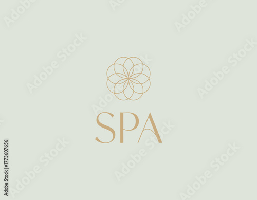 A serene spa logo featuring a delicate flower design, accompanied by soft and calming colors, which conveys relaxation and tranquility, perfect for a rejuvenating experience.
