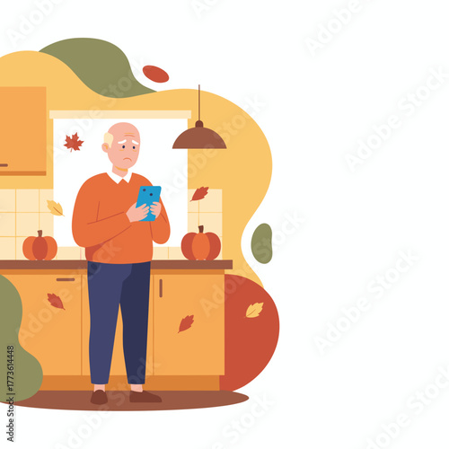 Worried senior man struggles with a smartphone in an autumn kitchen Digital challenge and aging concept