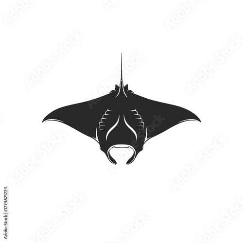 Silhouette of a majestic manta ray swimming.