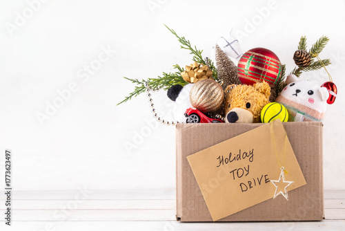 Wallpaper Mural Tradition holiday toys drive, cardboard box full with with kids toys and gifts Torontodigital.ca