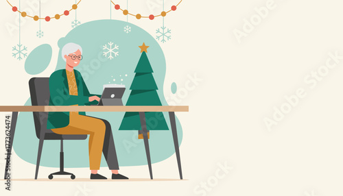 Happy senior woman working on tablet at Christmas desk Holiday business concept with copy space