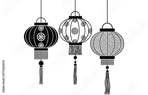 Decorative paper lanterns with intricate patterns and tassels, perfect for festive celebrations.