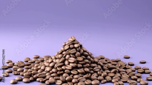 Wallpaper Mural Fragrant roasted coffee beans falling and forming a neat pile on a solid purple background, copy space Torontodigital.ca