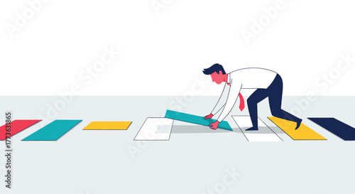 A dedicated businessman systematically constructs a colorful pathway by placing a turquoise block, illustrating the concepts of planning, strategy, and advancement.