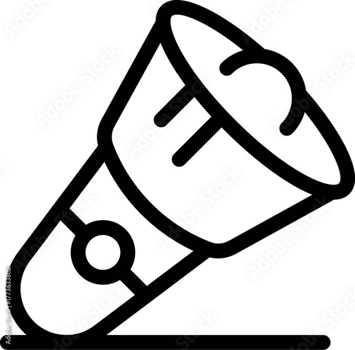 Flashlight emitting light while lying on a surface, providing portable illumination for various situations