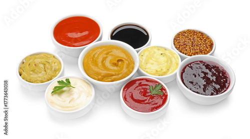 Cuadro en lienzo Different sauces in bowls isolated on white