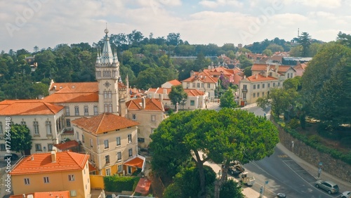Wallpaper Mural Top view of old city Sintra in Portugal traveling abroad in Portuguese sightseeing tour trip adventure travel in red rooftops of buildings houses historic town center with road daylight green trees Torontodigital.ca