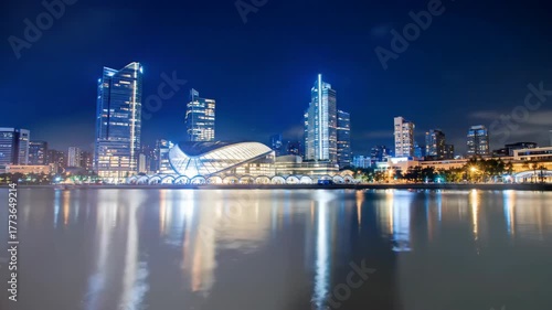 Wallpaper Mural City skyline at night with skyscrapers and water reflection, for travel ads Torontodigital.ca