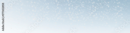 A realistic falling snow overlay on a blue gradient festive winter background with snowstorm and bokeh. A modern vector, white overlay with special light effect, for Christmas, New Year holiday design